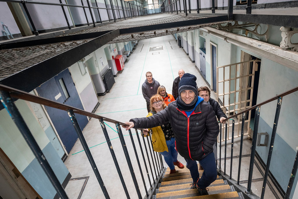 Visitors on prison wing - Cove Group